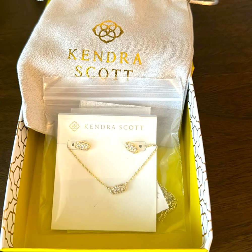 Kendra Scott pave gold toned necklace & earring set. New in original packaging.